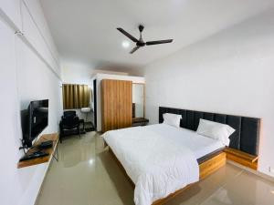 Vasant Vihar Resort客房内的一张或多张床位