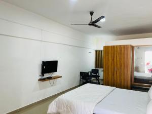 Vasant Vihar Resort客房内的一张或多张床位