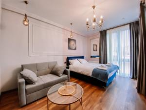 Кровать или кровати в номере Trinity Hotel