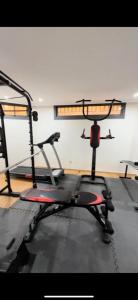 a gym with two tread machines in a room at vacances luxe in Marrakesh