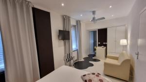 TV a/nebo společenská místnost v ubytování Albergo Ristorante Trieste Boves
