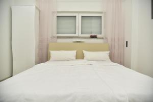 Posteľ alebo postele v izbe v ubytovaní Villa Jela - with pool