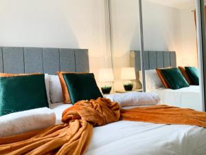 מיטה או מיטות בחדר ב-Antley House