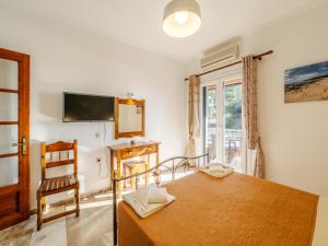 TV a/nebo společenská místnost v ubytování Pandora's Corfu Apartments