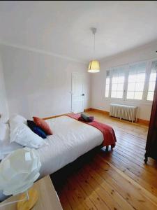 Postel nebo postele na pokoji v ubytování Chaleureuse maison proche centre