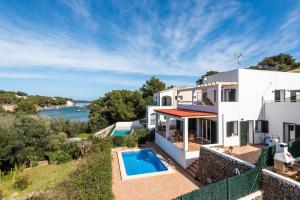 Vista de la piscina de Villa Sa Gavina - Addaia o d'una piscina que hi ha a prop