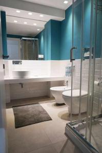 Koupelna v ubytování Favorita blue la tua suite a Palermo