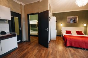 Postel nebo postele na pokoji v ubytování Hotel Renesse