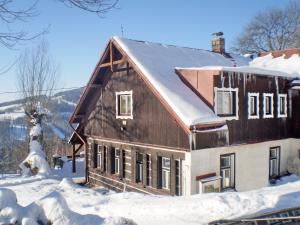 Horská chata Roubenka v zimě