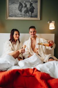 Postel nebo postele na pokoji v ubytování Hotel Renesse