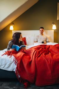 Postel nebo postele na pokoji v ubytování Hotel Renesse