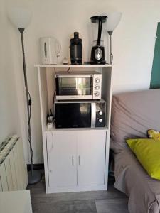 Kuchyňa alebo kuchynka v ubytovaní Coquet T2, Vue sur mer + 12 fotografií