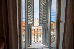 an open window with a view of a building at Studio Centre in Split