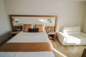 Letto o letti in una camera di Hotel Soleil Business Class