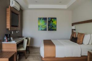 Letto o letti in una camera di Hotel Soleil Business Class