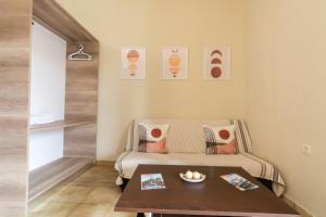 Ένα ή περισσότερα κρεβάτια σε δωμάτιο στο Naos Studios - Private Apartment