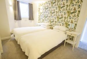 Postel nebo postele na pokoji v ubytování Garden Apartment Winchester
