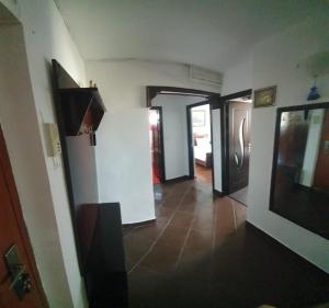 Una televisión o centro de entretenimiento en Blue Sky Apartament 8 fotos más
