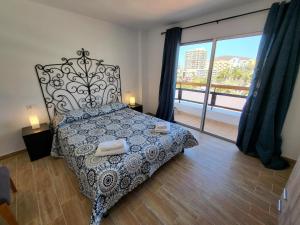 Voodi või voodid majutusasutuse Jardines Canarios 3 toas