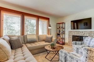 a living room with a couch and a fireplace at 7th Mountain Bliss in Bend