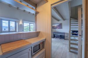 Kuchyňa alebo kuchynka v ubytovaní TPA Apartamento en Bolvir para 5 personas Zona Com. y piscina + 12 fotografií