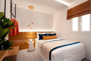 Posteľ alebo postele v izbe v ubytovaní Margaret Luxury Suites