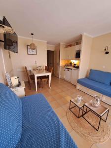 Posezení v ubytování Les Restanques du Golfe de Saint-Tropez + 2 fotografie