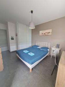 Posteľ alebo postele v izbe v ubytovaní T2 neuf près des plages et commerces