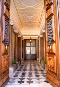 a hallway of a building with a ceiling at Esposizione Boutique in Rome