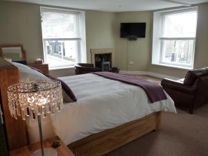 A bed or beds in a room at Town View Alston