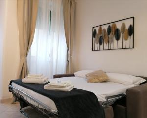 A bed or beds in a room at Vatican Walls Apartment