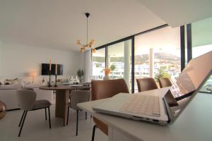 A seating area at Mara's Apartments Higueron West - Like A House - 246 Square Meters of Private Terrace & Garden - Morning and Evening Sun