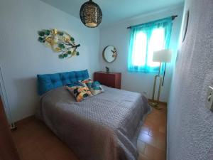 Posteľ alebo postele v izbe v ubytovaní A 8 mn A PIED DES PLAGES APPARTEMENT AVEC PISCINE ET TENNIS