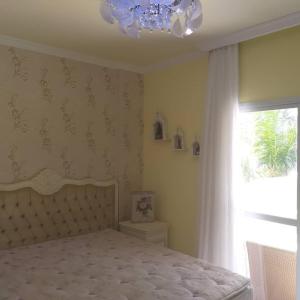 Postel nebo postele na pokoji v ubytování Apartamento Caioba