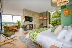 Ένα ή περισσότερα κρεβάτια σε δωμάτιο στο Hotel Salento Real Eje Cafetero