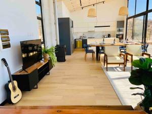 Ruang duduk di Acogedora y Moderna Casa Ideal Para Descansar