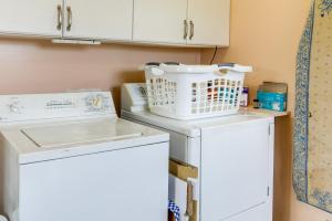a laundry room with a washer and dryer at Waterfront Getaway on 10 Acres Near Sunset Beach! in Warrenton +22 photos