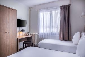 Postel nebo postele na pokoji v ubytování Sure Hotel By Best Western Lorient Centre