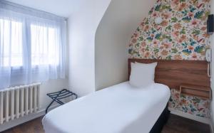 Postel nebo postele na pokoji v ubytování Sure Hotel By Best Western Lorient Centre