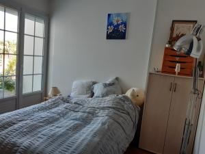 Posteľ alebo postele v izbe v ubytovaní Maison de plein pied, lumineuse, très fonctionnelle