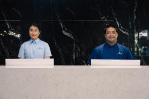 Členové personálu v ubytování Hotel Tano Guam + 30 fotografií