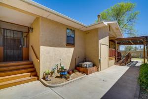 a house with a patio and a grill in front of it at Cozy Las Cruces Home - 2 Mi to New Mexico State! in Las Cruces