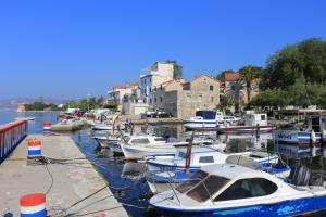 a bunch of boats are docked in a harbor at Apartments with a parking space Kastel Kambelovac, Kastela - 21071 in Kaštela