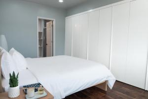 Postel nebo postele na pokoji v ubytování Hotel Tano Guam