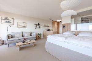 Postel nebo postele na pokoji v ubytování Appartement Ocean Suite