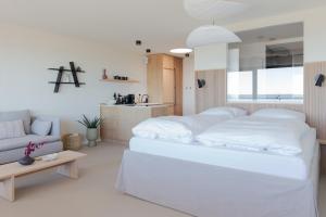 Postel nebo postele na pokoji v ubytování Appartement Ocean Suite