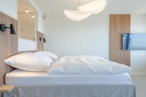 Postel nebo postele na pokoji v ubytování Appartement Ocean Suite