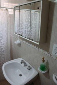 Et badeværelse på Departamento muy amplio y cómodo. Impecable! PB + 17 billeder