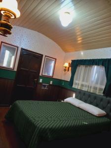 Giường trong phòng chung tại Tren Del Desierto