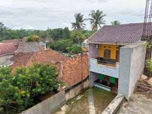 a house with a view of the roofs at GEA Syariah in Bengkeng